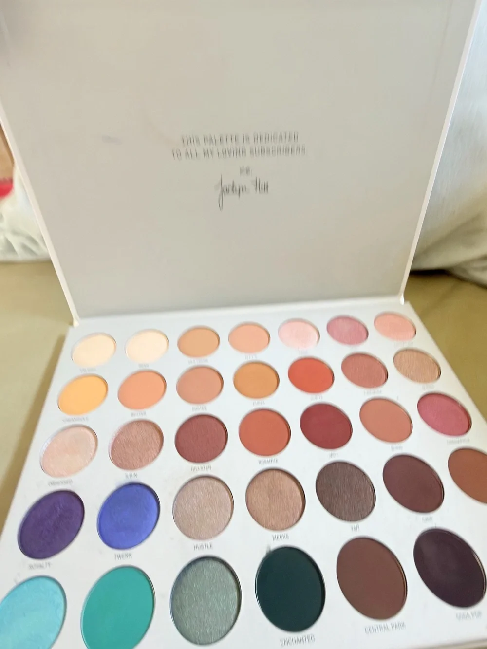 Morphe Jaclyn Hill Palette in Pale Pink with Gold Text